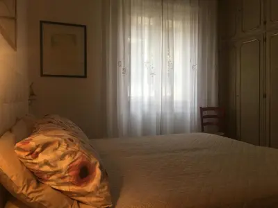 Letto o letti in una camera di Marie Home Florence