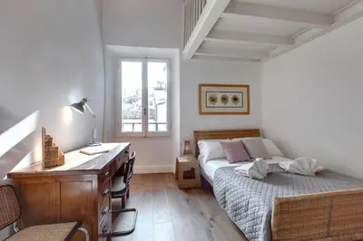 Letto o letti in una camera di Il Prato Apartment by Mamo Florence
