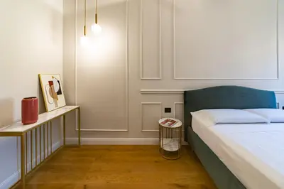 Letto o letti in una camera di Leovinci Rooms
