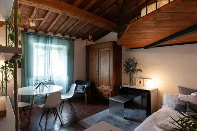 Letto o letti in una camera di Cosy Apartment Sant'Ambrogio