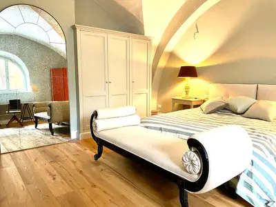 Letto o letti in una camera di Accademia Newly Renovated Ancient Abbey