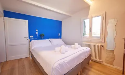 Letto o letti in una camera di Torregalli- Terrace Apartment