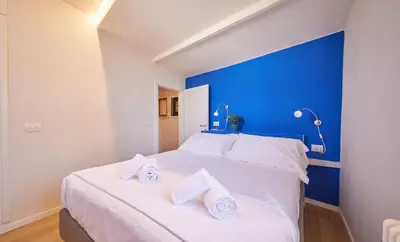 Letto o letti in una camera di Torregalli- Terrace Apartment