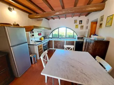 Cucina o angolo cottura di La Favilletta Casa Vacanze
