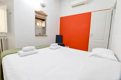 Letto o letti in una camera di Spada Apartment