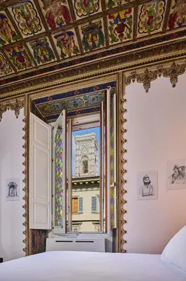 Letto o letti in una camera di Duomo Luxury Florence