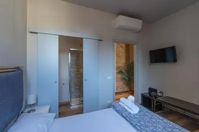 Letto o letti in una camera di [Brunelleschi Suite]