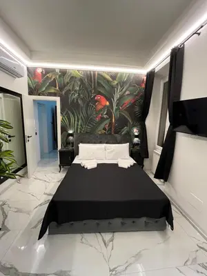 Letto o letti in una camera di Suites - ghibellina 92