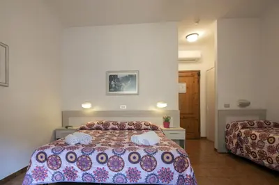 Letto o letti in una camera di Foresteria Valdese di Firenze