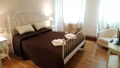 Letto o letti in una camera di Maison Sara