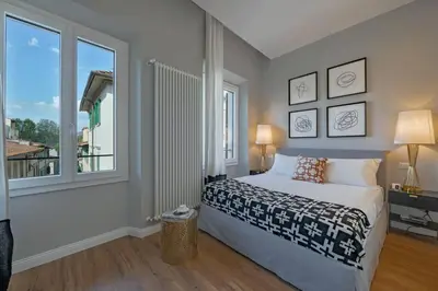 Letto o letti in una camera di Apartments Florence - Flamingo with santa croce view