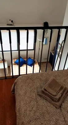 Letto o letti in una camera di Gemme Fiorentine Apartments in front of the train station 5 minutes from the centre Free parking