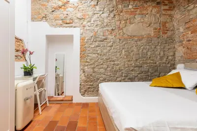 Letto o letti in una camera di Central studio S. Spirito, AC