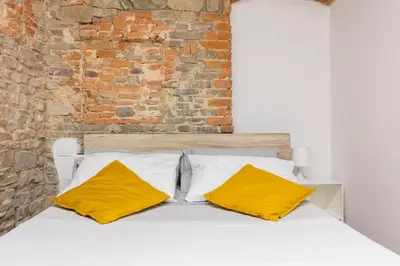 Letto o letti in una camera di Central studio S. Spirito, AC