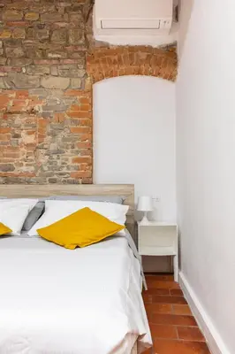 Letto o letti in una camera di Central studio S. Spirito, AC