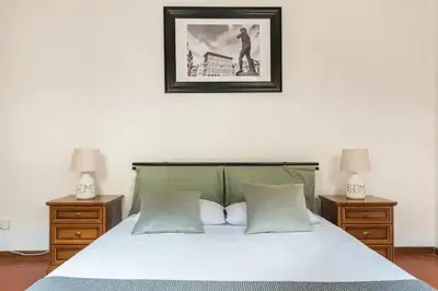 Letto o letti in una camera di Residenza degli Albizi