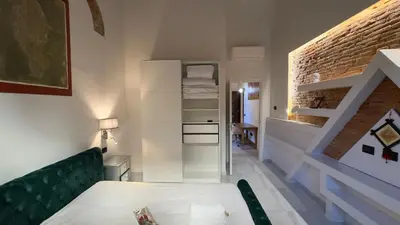 Letto o letti in una camera di Suite Stylish & Cozy Apartment in the Heart of Florence