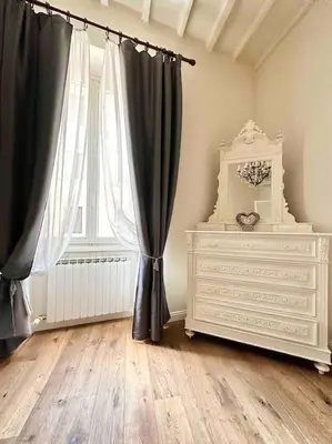 Letto o letti in una camera di Luxury apartment close to S. Frediano – Victor