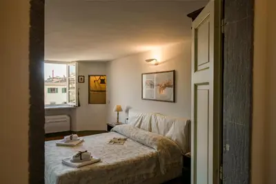 Letto o letti in una camera di Proconsolo Bargello Apartment by Mamo Florence