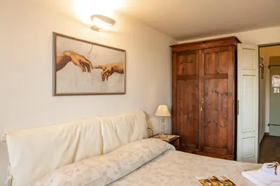 Letto o letti in una camera di Proconsolo Bargello Apartment by Mamo Florence