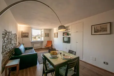 Area soggiorno di Proconsolo Bargello Apartment by Mamo Florence