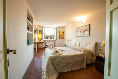 Letto o letti in una camera di Proconsolo Bargello Apartment by Mamo Florence