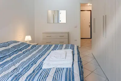 Letto o letti in una camera di Casa Roger Scandicci Centro Facile accesso a Firenze