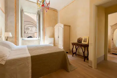 Letto o letti in una camera di Appartamento Signoria