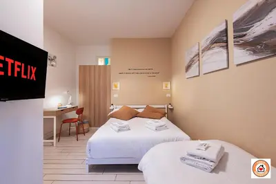 Letto o letti in una camera di Gioiello Fiorentino - Duomo 2 minuti a piedi