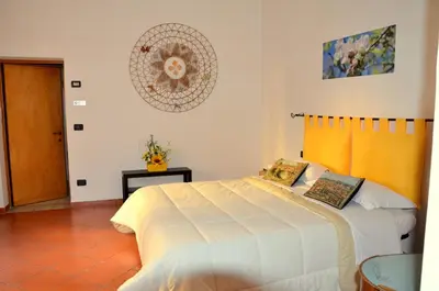 Letto o letti in una camera di L'Acchiappasogni