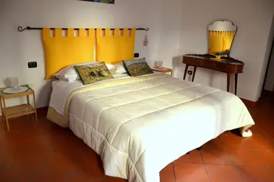 Letto o letti in una camera di L'Acchiappasogni