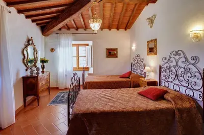 Letto o letti in una camera di Il Frantoio delle Grazie