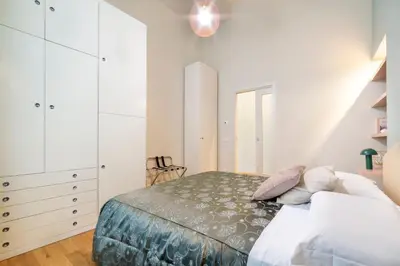 Letto o letti in una camera di Classy nest in a historical palace