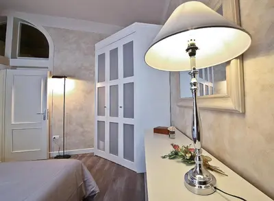 Letto o letti in una camera di Apartments Florence - Giglio santa trinita