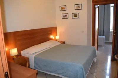 Letto o letti in una camera di Hotel Dalmazia