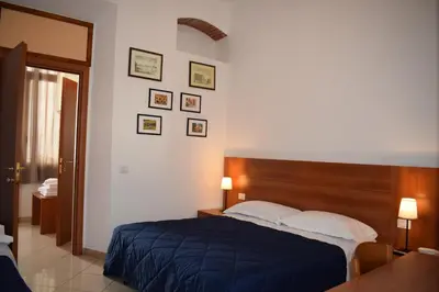Letto o letti in una camera di Hotel Dalmazia