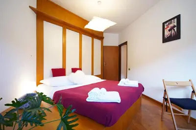Letto o letti in una camera di Appartamento Borgo degli Artisti