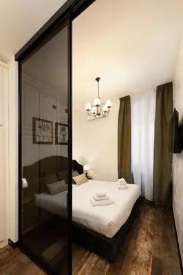 Letto o letti in una camera di Pitti Elegant Suite