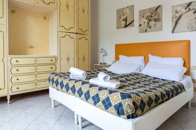 Letto o letti in una camera di San Lorenzo Market - 2 Bedroom Apartment
