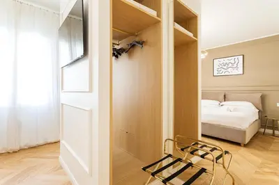 Letto o letti in una camera di Luxury apartment - KUKI STAY Ponte Vecchio