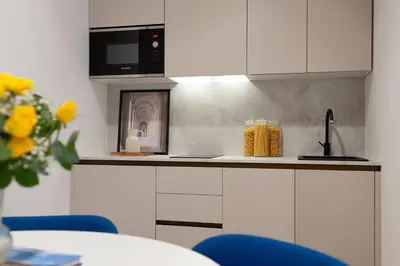 Cucina o angolo cottura di Cavour FillYourHomeWithLove Design Apartment