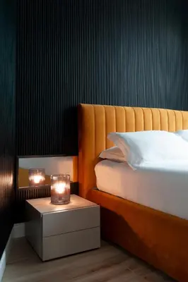 Letto o letti in una camera di Cavour FillYourHomeWithLove Design Apartment