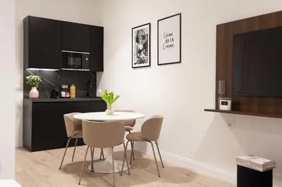 Cucina o angolo cottura di Cavour FillYourHomeWithLove Design Apartment