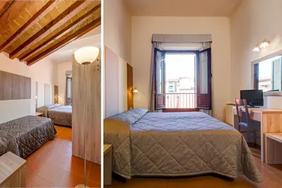 Letto o letti in una camera di Hotel Arno Bellariva