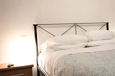 Letto o letti in una camera di Wine Apartments Florence Verdicchio