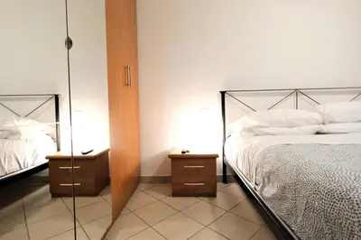 Letto o letti in una camera di Wine Apartments Florence Verdicchio