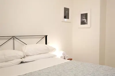 Letto o letti in una camera di Wine Apartments Florence Verdicchio