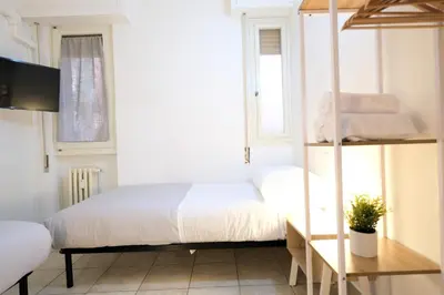Letto o letti in una camera di Wine Apartments Florence Verdicchio