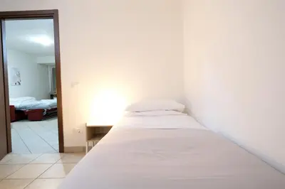 Letto o letti in una camera di Wine Apartments Florence Verdicchio