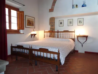 Letto o letti in una camera di Agriturismo Podere la Cava